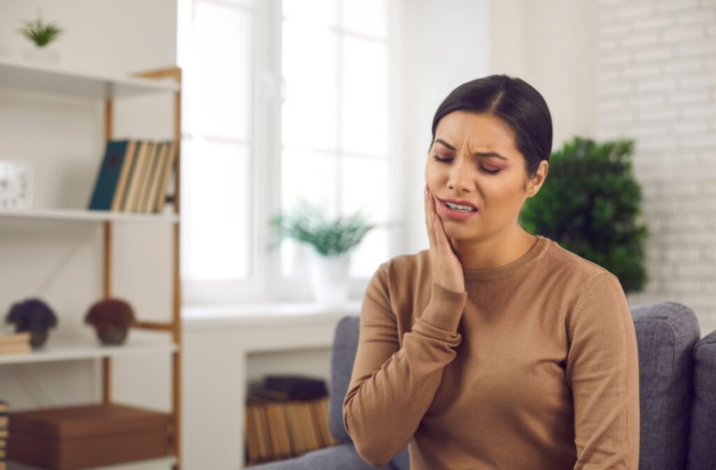 A person suffering from TMD pain in their jaw