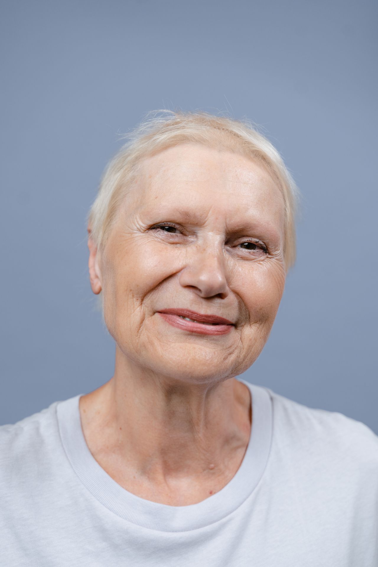 Smiling woman in a white t-shirt